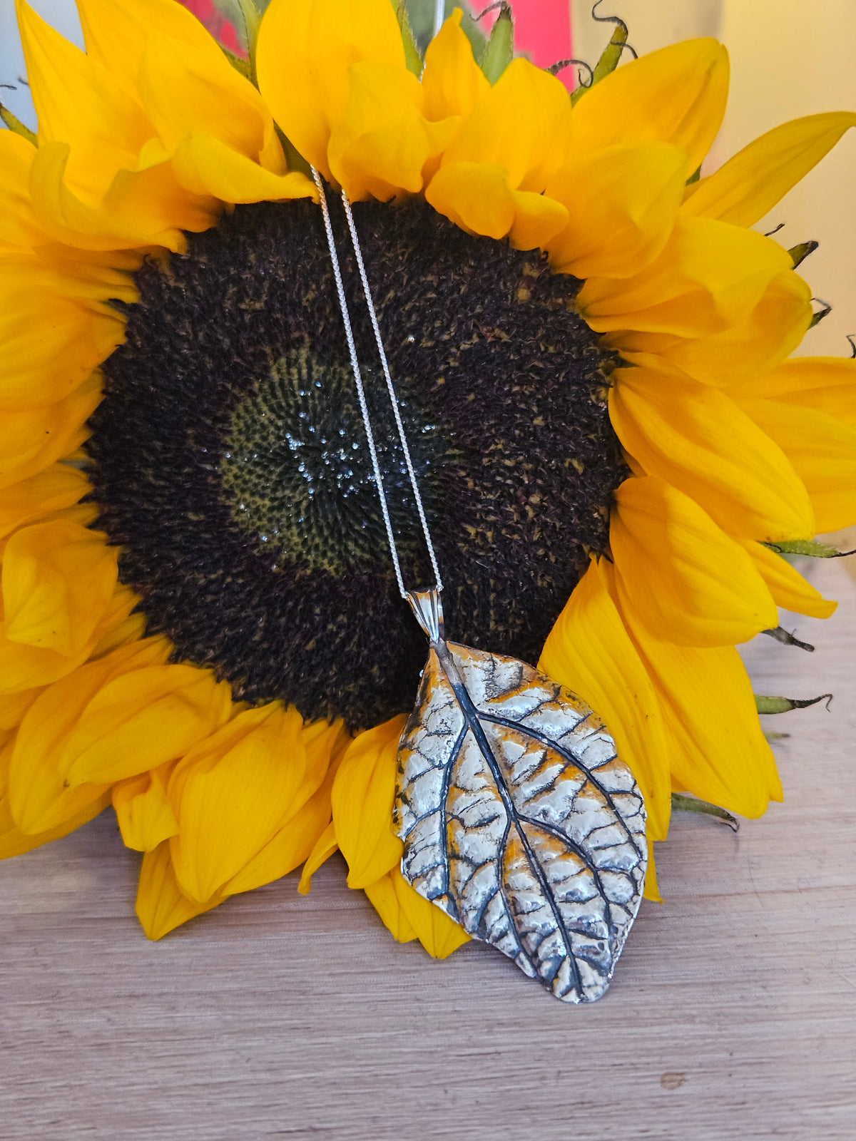Theia leaf pendant